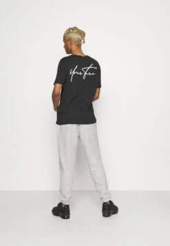 YOURTURN Unisex - Trainingsbroek - Mottled Light Grey -Yourturn Verkoopwinkel 44af697d8af34693a7b3385401313f6d