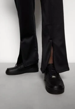 YOURTURN Unisex - Trainingsbroek - Black -Yourturn Verkoopwinkel 5c4f8c8cb63e40f79401d8fdfffc3743