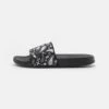 YOURTURN Unisex - Badslippers - Black -Yourturn Verkoopwinkel b786edc3fc8e48ad9dea081635fddd24