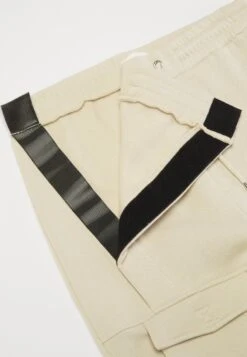 YOURTURN Trainingsbroek - Beige -Yourturn Verkoopwinkel d9756528a5f046829b9e56dbebee00ba