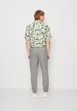 YOURTURN Unisex - Trainingsbroek - Grey -Yourturn Verkoopwinkel e10191e8f21644bbb9d78607bbda91d5