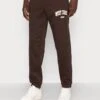 YOURTURN Unisex - Trainingsbroek - Dark Brown -Yourturn Verkoopwinkel e1108e6c89a84640b8c8bc8fe7ba75bc